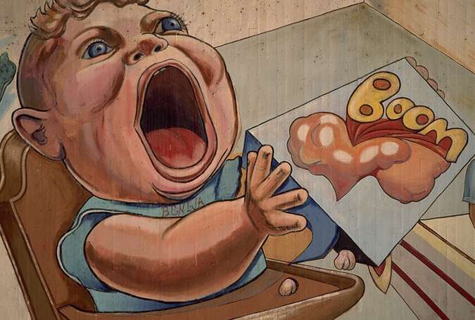 Caricatura de un ni�o con la boca abierta